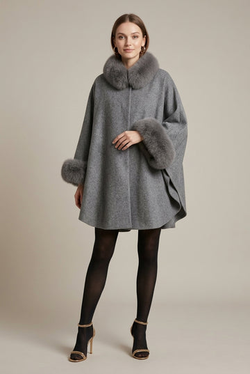 Cape en laine avec bordure en fausse fourrure pour femme